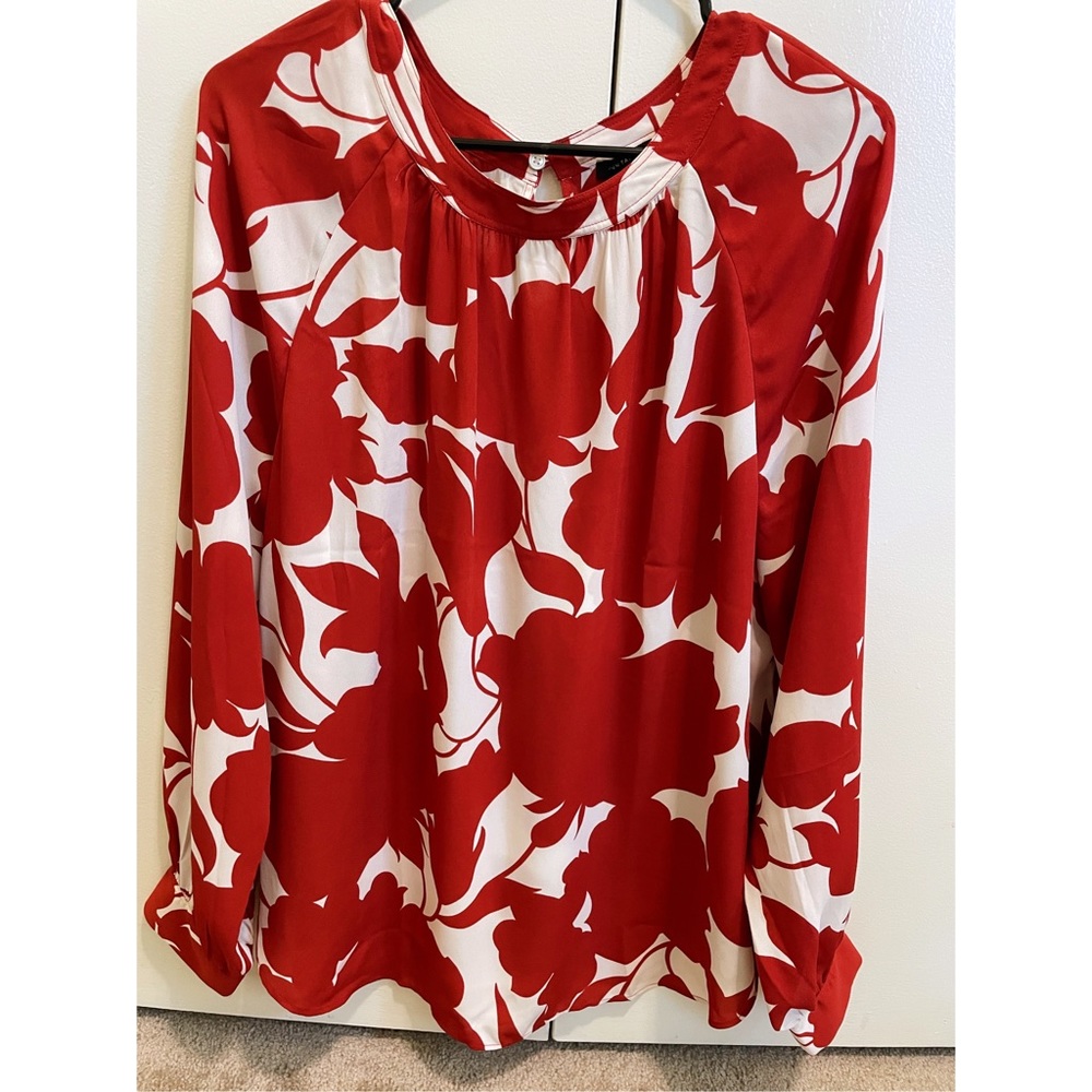 Cream w/orange floral print blouse from Ann Taylor.
